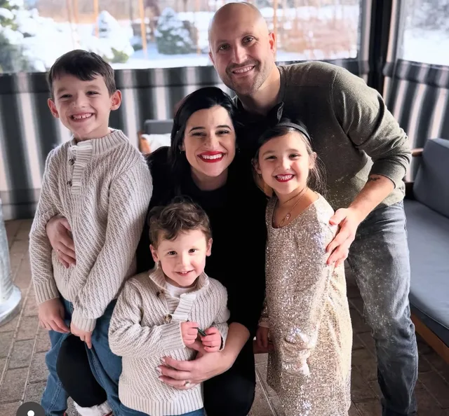 Stu with his wife and three of his four kids
